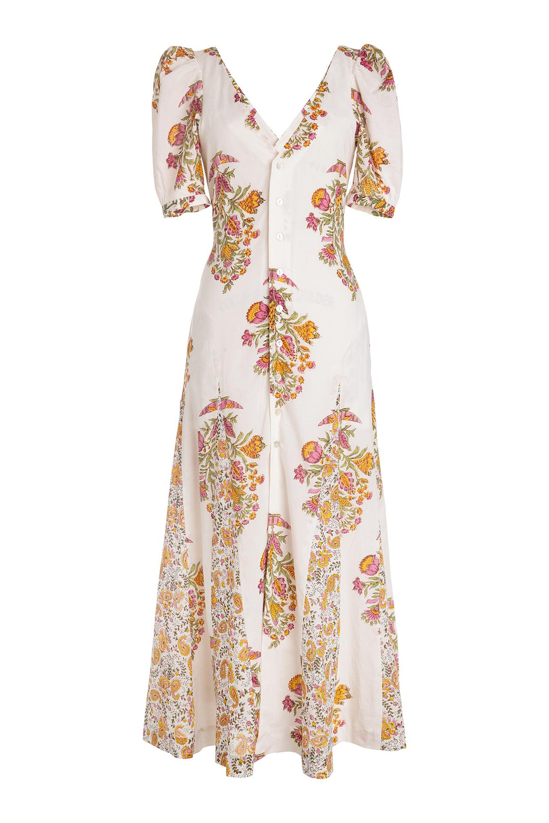 The Bianca Belle Dress is a white floral v-neck dress with short puffy sleeves, featuring a hand-printed pattern of pink, yellow, and orange flowers complemented by green leaves. This artisan textile creation includes a button-down front and a flowing skirt.