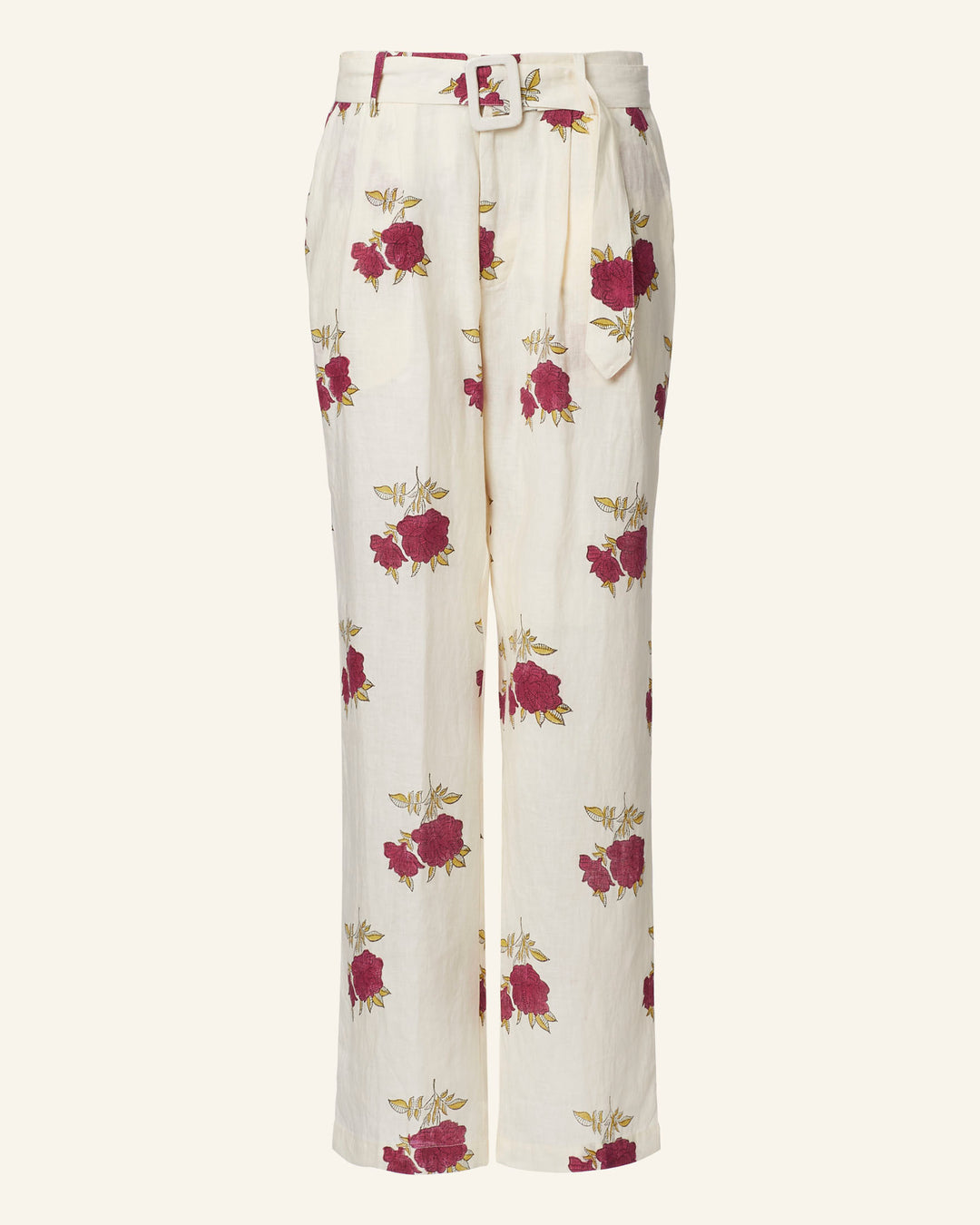 The Colette Cerise Rosette Pant is a pair of beige high-waisted pants with a matching belt, adorned with a hand-printed pattern featuring pink roses and green leaves. These trousers boast a pleated front and straight leg design.