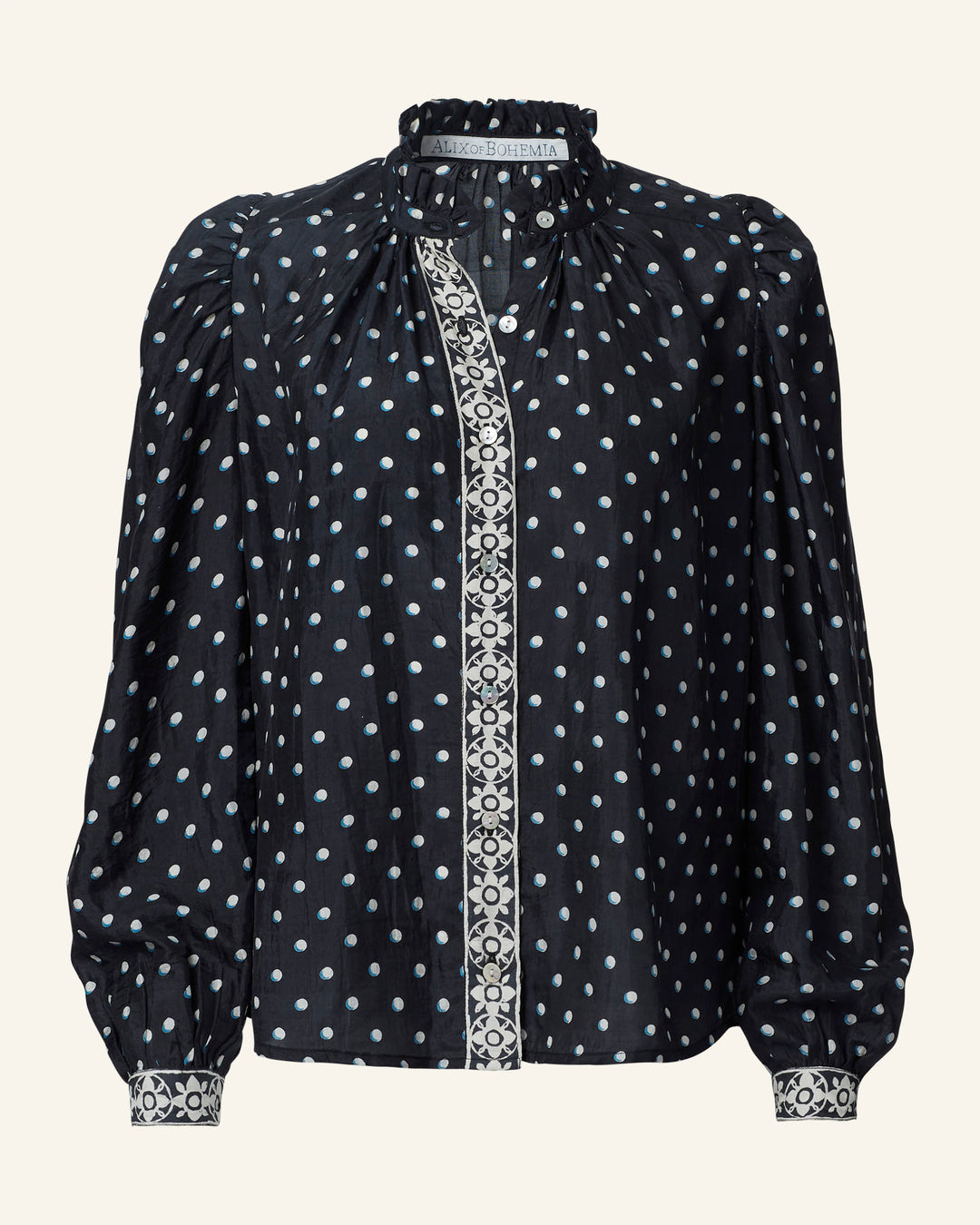 Annabel Raven Dot Silk Shirt featuring long puffed sleeves and elegant white floral lace trim along the front, collar, and cuffs.