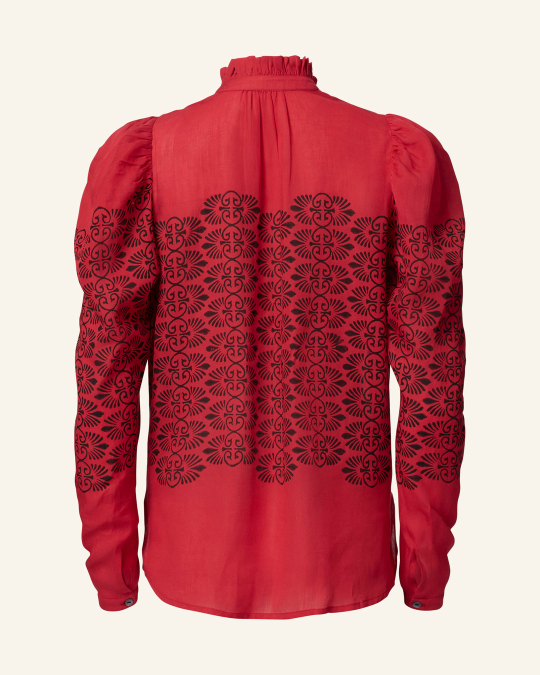 The Artemis Cherry Trellis Shirt is a vintage-inspired piece featuring long sleeves, a high collar, and intricate black embroidery embellishing the back and sleeves. Crafted from lightweight Tencel fabric, it provides a semi-transparent quality with a subtle sheen that exudes timeless elegance.