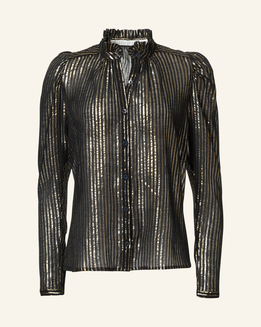 Introducing the Artemis Moonlight Shirt: This blouse exudes '70s disco charm with its metallic striped design, long sleeves, and ruffled collar. Crafted from fabric adorned with vertical silver Lurex stripes, it shimmers beautifully with reflective detail. The buttons down the front complete the look, and it's showcased against a plain backdrop.