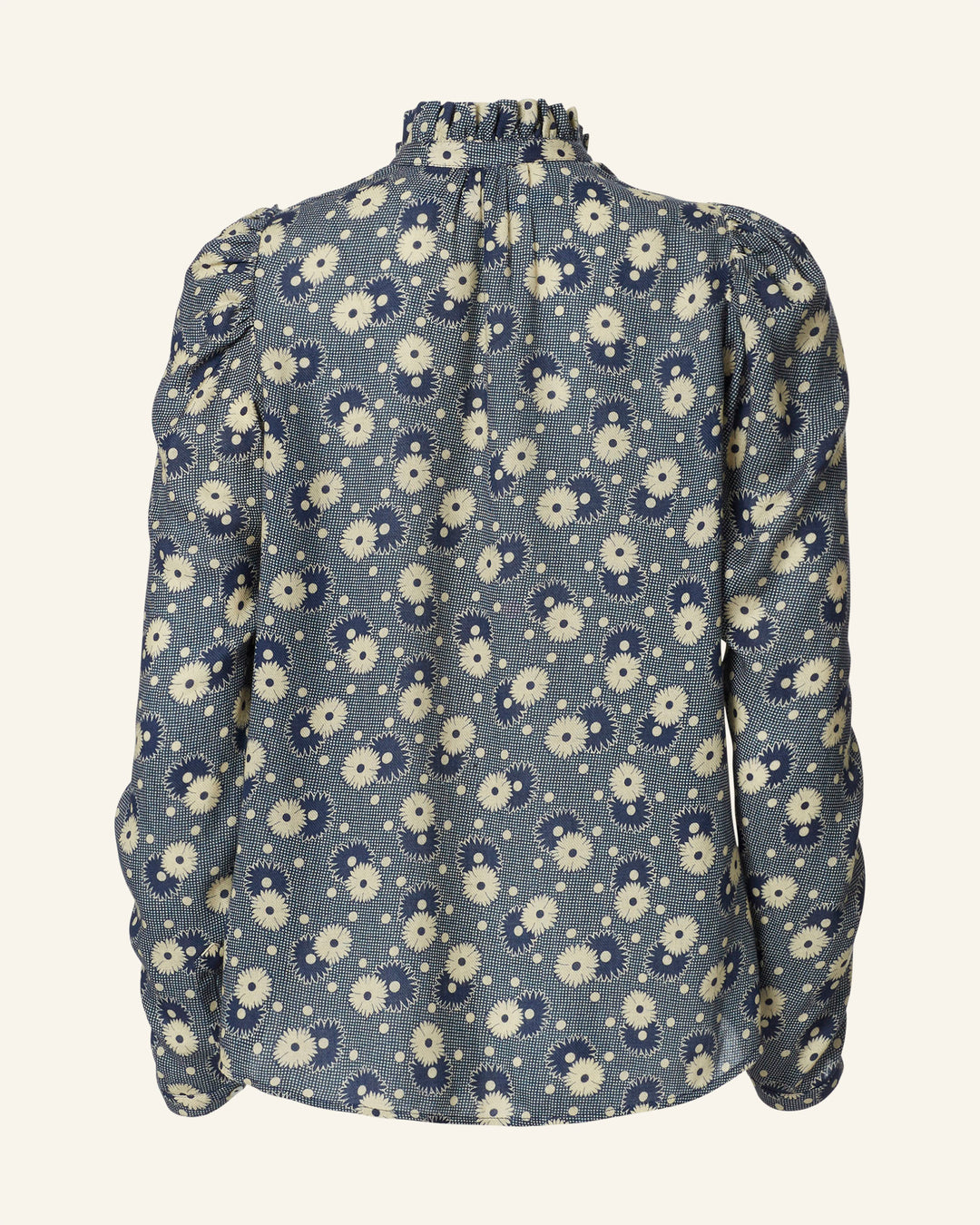 Back view of the Artemis Navy Daisy Shirt, a long-sleeved blouse with a high ruffled collar and a '70s-style floral print. It boasts a textured fabric appearance, puffed shoulders, and a loose fit that exudes vintage-inspired charm.