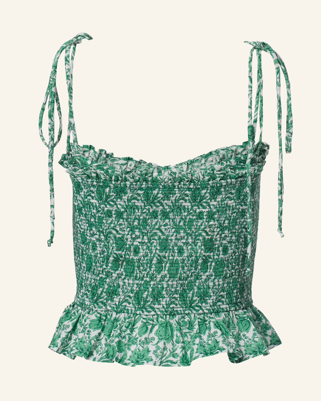 The Clara Laurel Vine Top is a Liberty-print green floral-patterned cropped top with adjustable spaghetti straps and a charming ruffled hem.