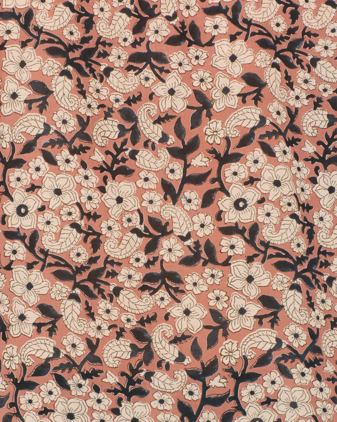 The Annabel Sepia Floral Shirt is a patterned cotton-silk blend with white and black floral and leaf designs on a peach background.