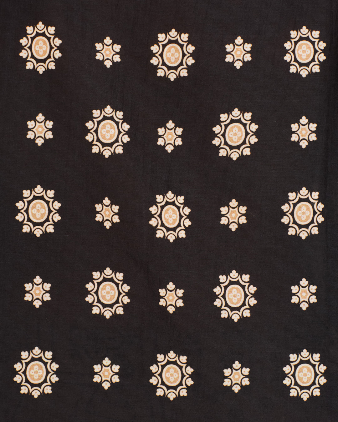 The Artemis Bronco Bandana Shirt is a black cotton-silk blend shirt with a grid of beige circular floral motifs.