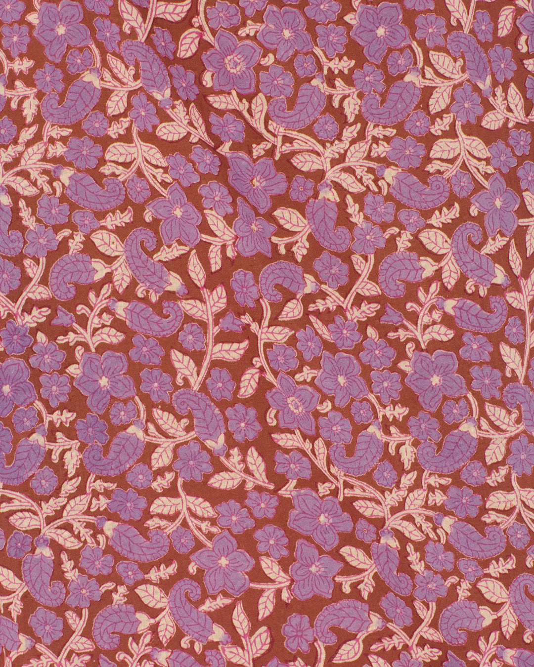 The Artemis Twilight Floral Shirt features red fabric adorned with intricate purple and pink floral motifs, including flowers, leaves, and curved stems—perfect for a standout look.