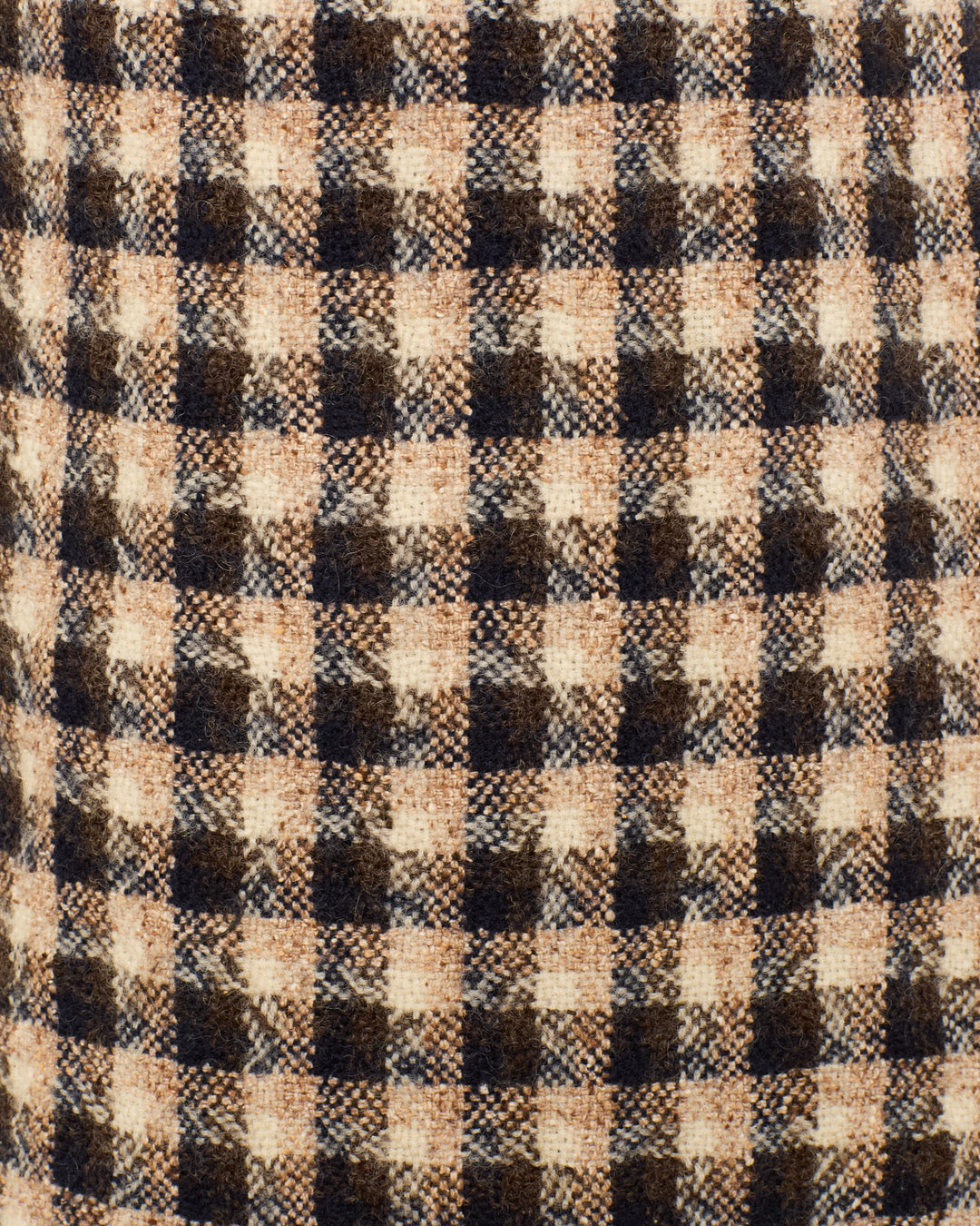 Close-up of Italian virgin wool fabric in a black and beige plaid pattern, featured in the Farah Trail Dust Pant—perfect for a stylish, high-waisted look.