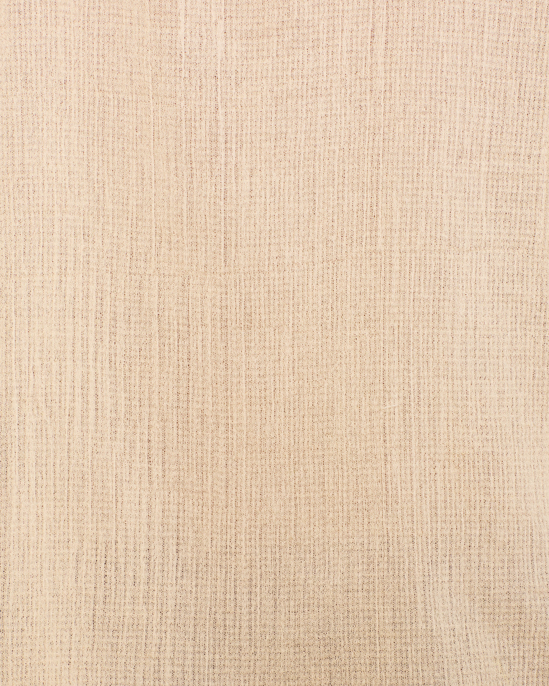 Close-up of the beige, textured woven fabric of the Artemis Prairie Tint Shirt, showcasing visible vertical and horizontal threads reminiscent of classic cotton dobby material with a puff sleeve detail.