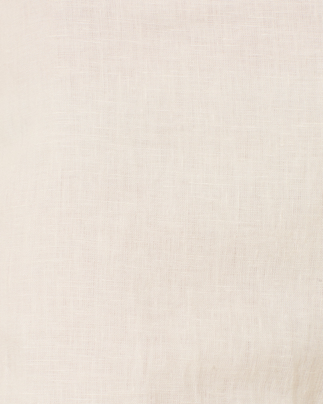 Close-up of the Holland Pearl Linen Pant in light beige, highlighting its woven texture and subtle crisscross pattern—ideal for a classic sailor-inspired style.