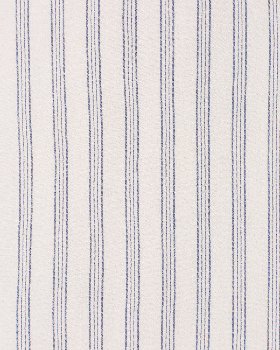 The Eden Coastal Stripe Dress is a white cotton maxi dress with crisp, evenly spaced vertical blue stripes and a soft lining for a breezy coastal look.