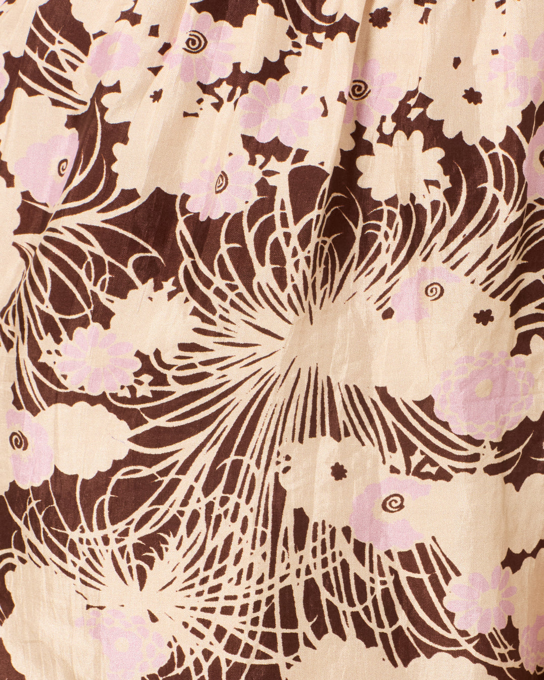 Close-up of Lucy Dandelion Dusk Silk Short fabric: beige background, dark brown abstract lines, and light pink floral patterns—perfect for unique floral shorts.