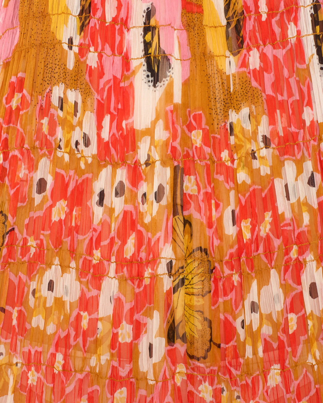 Close-up of the Emrys Marigold Meadow Dress, showcasing crinkled viscose-chiffon with a floral and butterfly print in red, yellow, white, and black—ideal for ruched tiers on a flowing maxi dress.