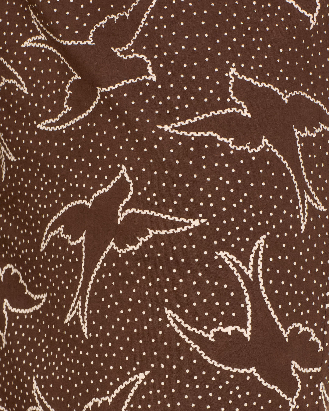 The Farah Clove Swallow Pant features brown fabric with cream swallow motifs and small dots, ideal for a chic high-waisted look.