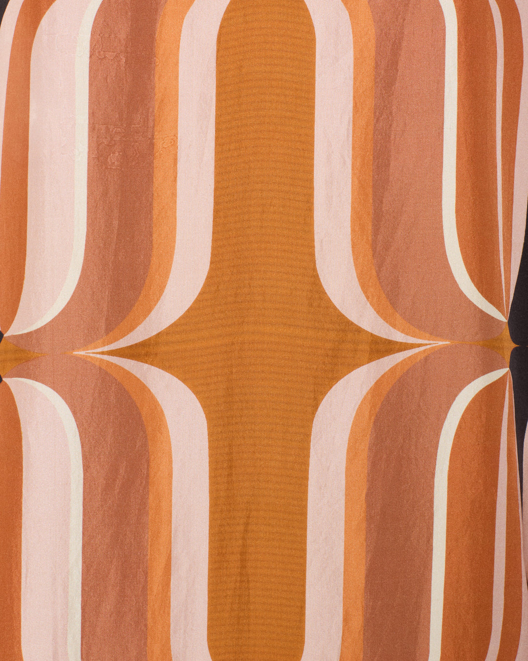 The Spice Market Mesa Verde Dress features a mid-century modern geometric pattern with symmetrical, curved lines in orange, brown, pink, and cream—ideal for a retro-inspired look.