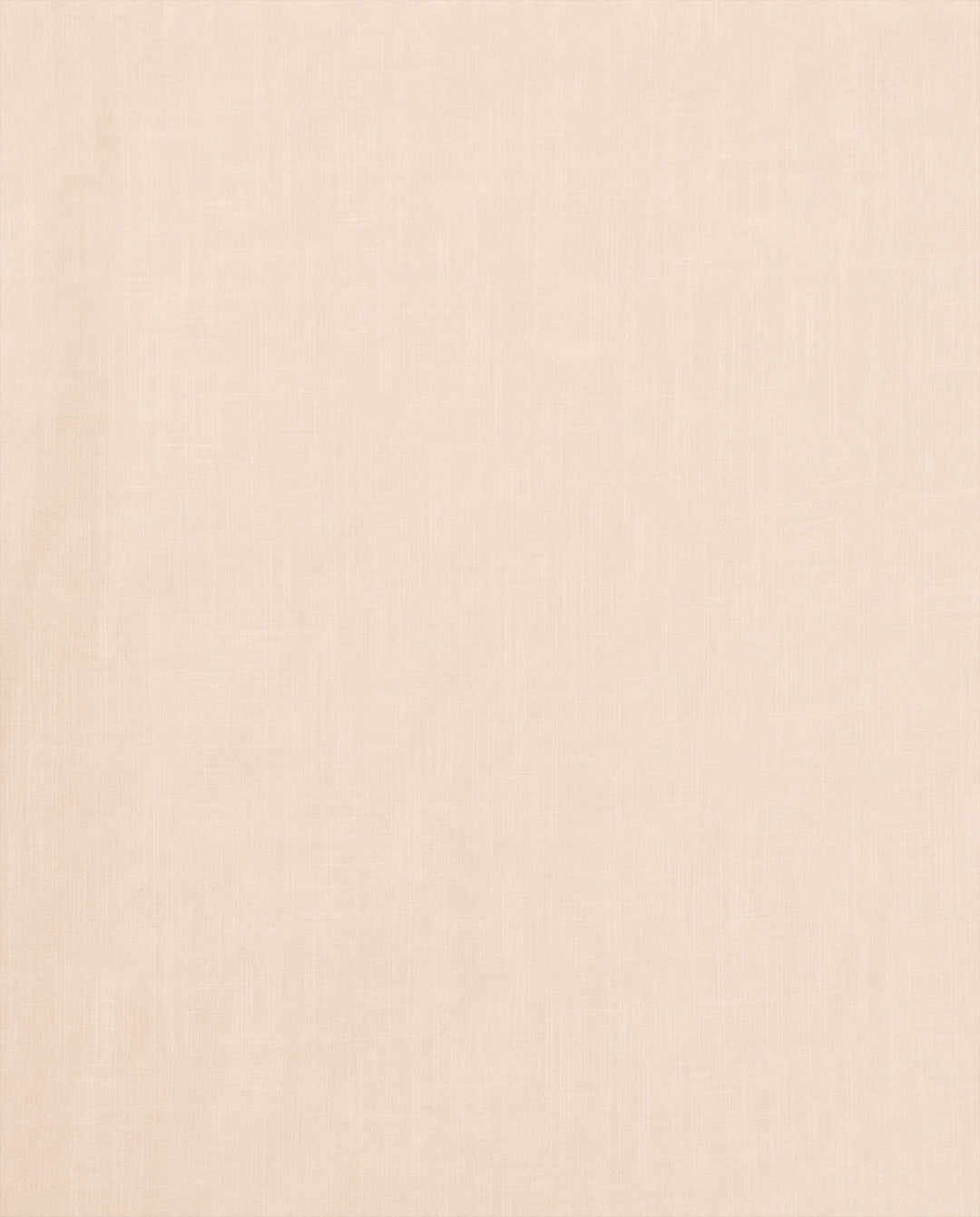 Crafted from light beige fabric with a subtle, visible weave texture, the Winnie Stone Shirt offers a smooth and uniform surface, free from patterns or distinct markings. This makes it an excellent choice for highlighting delicate design elements like puff shoulders or a ruffled collar.